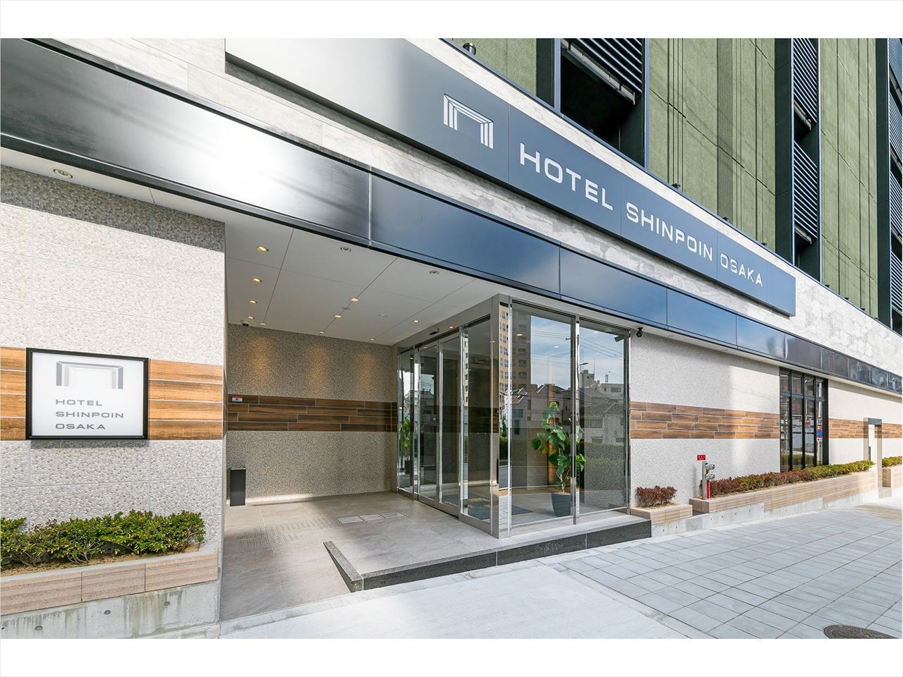 This is the entrance of a new and beautiful hotel.