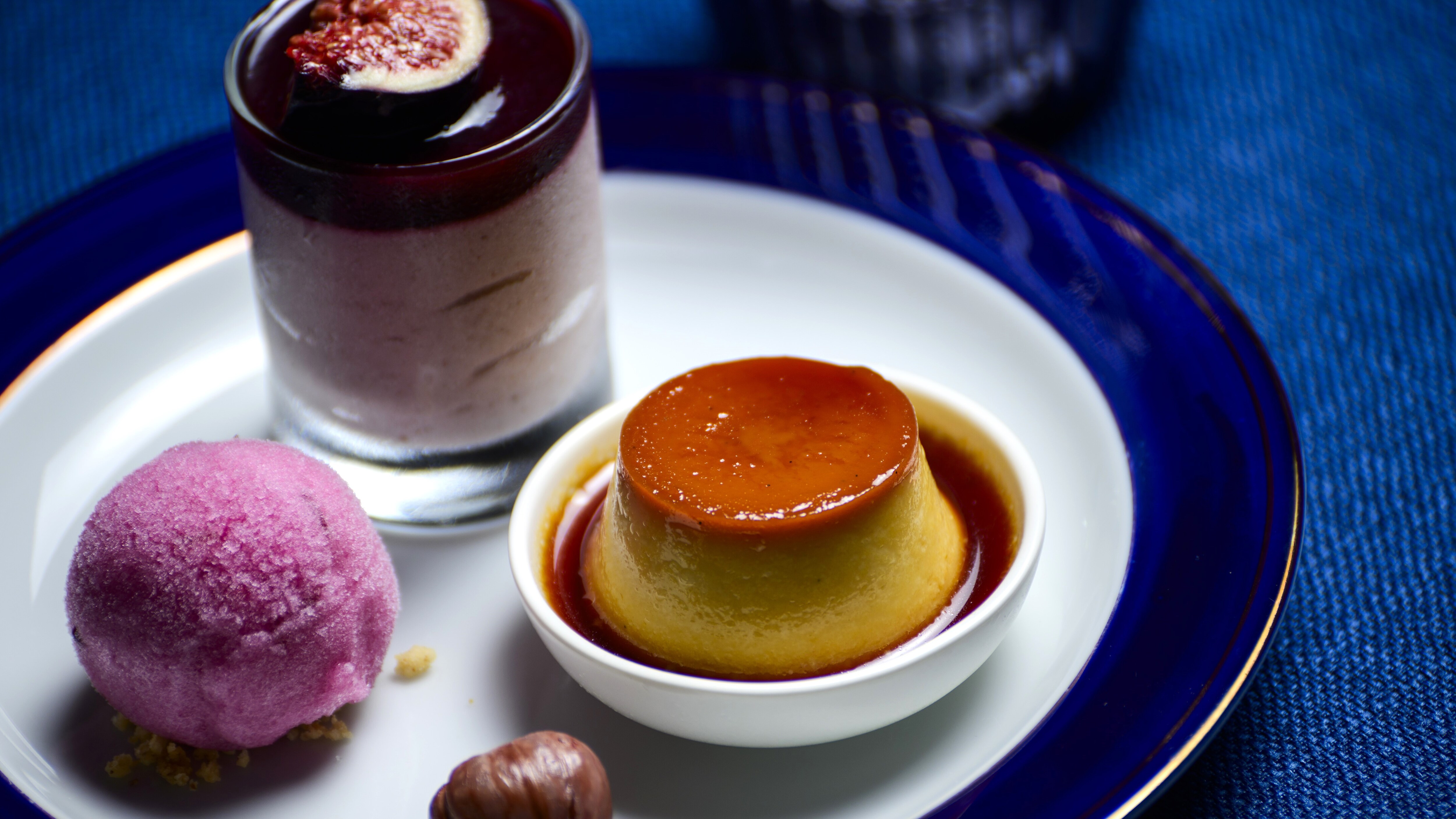 Food image (Assorted desserts: fig mousse, pumpkin pudding, black grape sorbet)