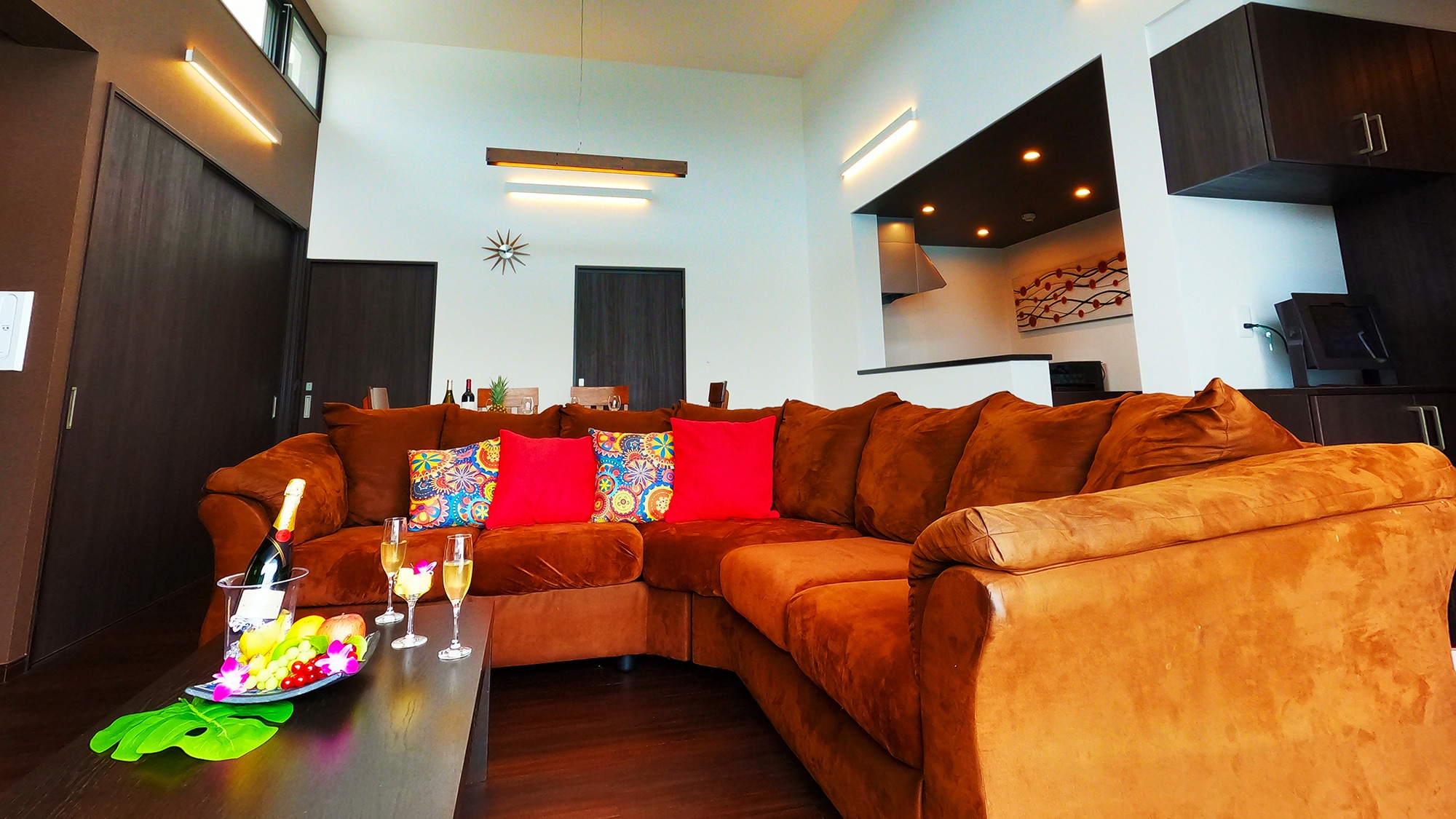 [Executive] We have prepared a large American-made sofa for your comfort.