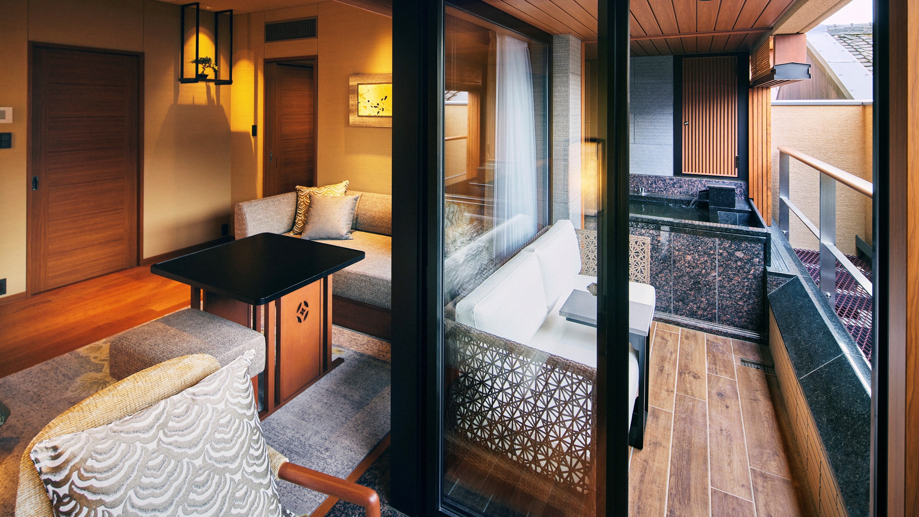 Miyabi Corner Twin: The private terrace has an open-air natural hot spring bath and a sofa.