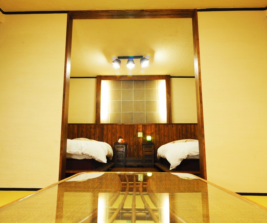 Japanese-Western style room with twin bed (11m2) + 8 tatami Japanese-style room