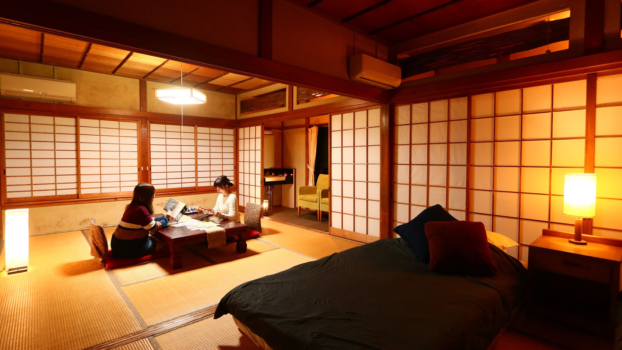 The twin Japanese-style rooms are spacious and can accommodate two people or a group.