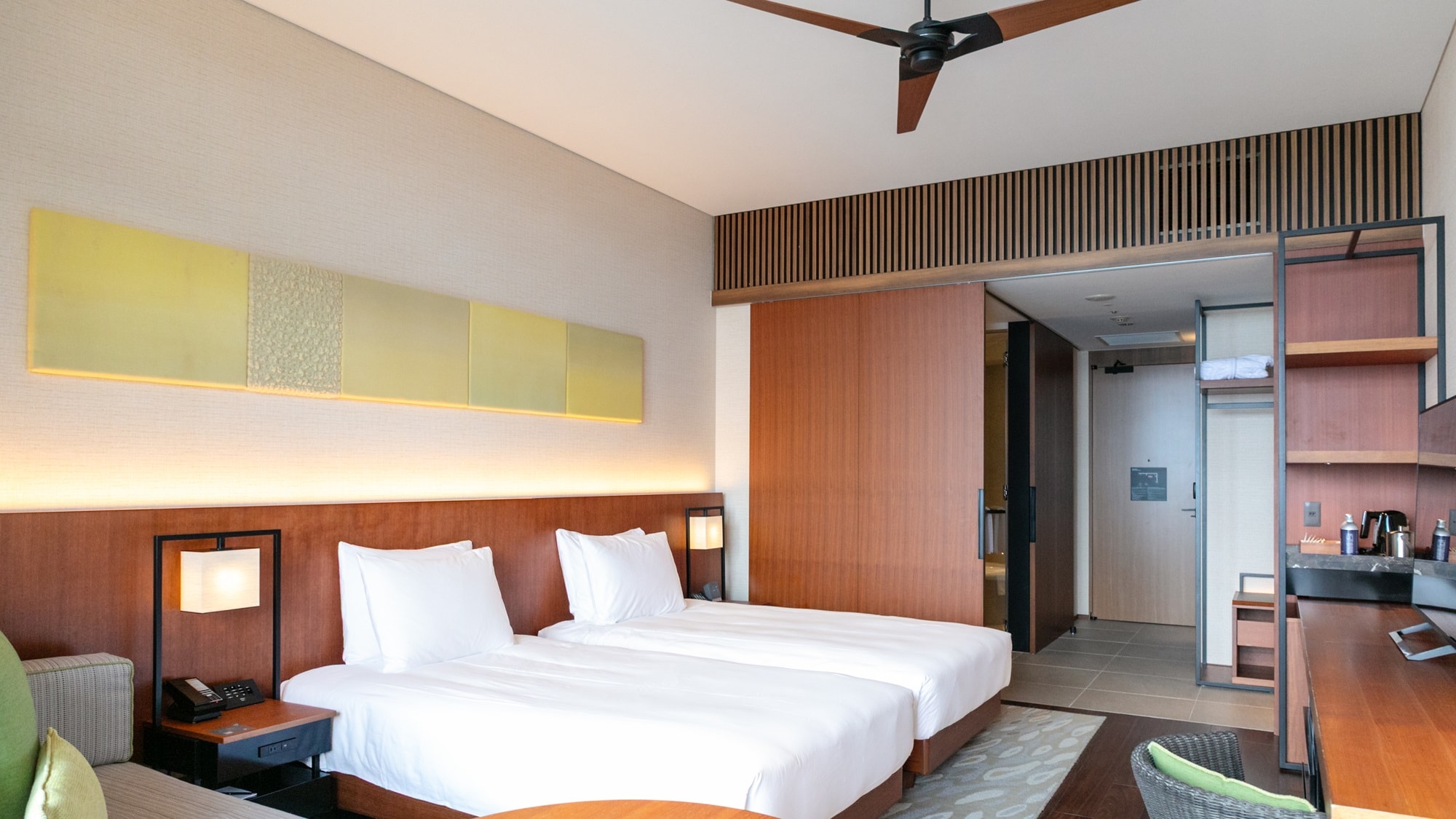The room can accommodate up to 5 people (including 3 adults) using 2 beds and a sofa bed.