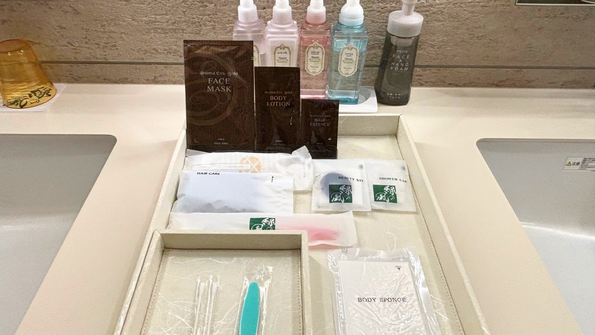 [Ladies' room amenities] A full range of amenities including face masks, hair essence, and body lotion