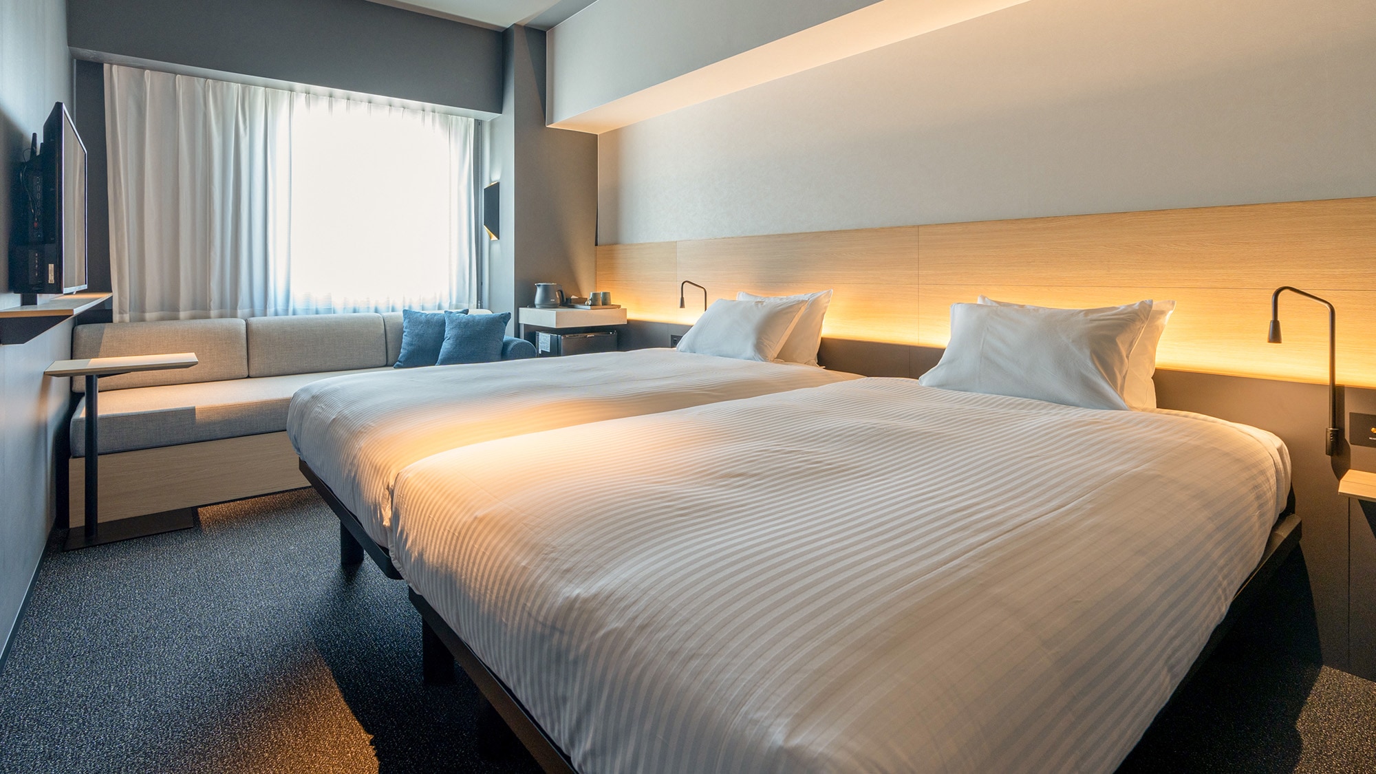 [Corner Twin Room] This is the largest room in our hotel at 23 square meters. All rooms are "corner" rooms, there are only 9 rooms!