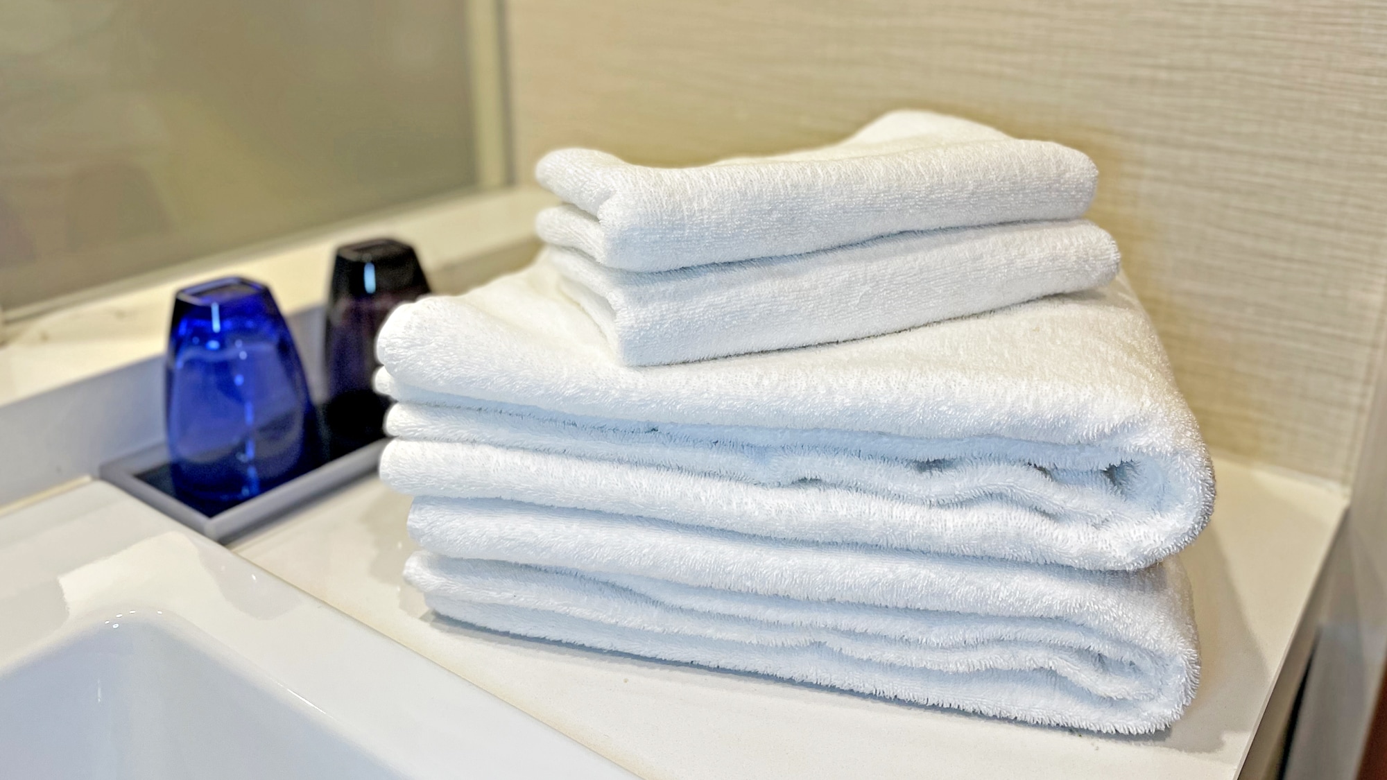 Select domestic towels with high momme that are highly absorbent and gentle on the skin