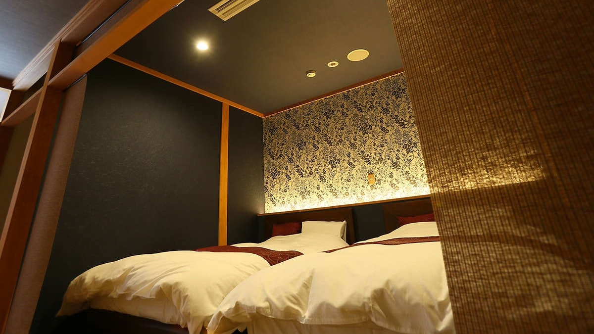  ■ Special room with open-air bath with a view 12 tatami mats + twin <Japanese and Western room> An example