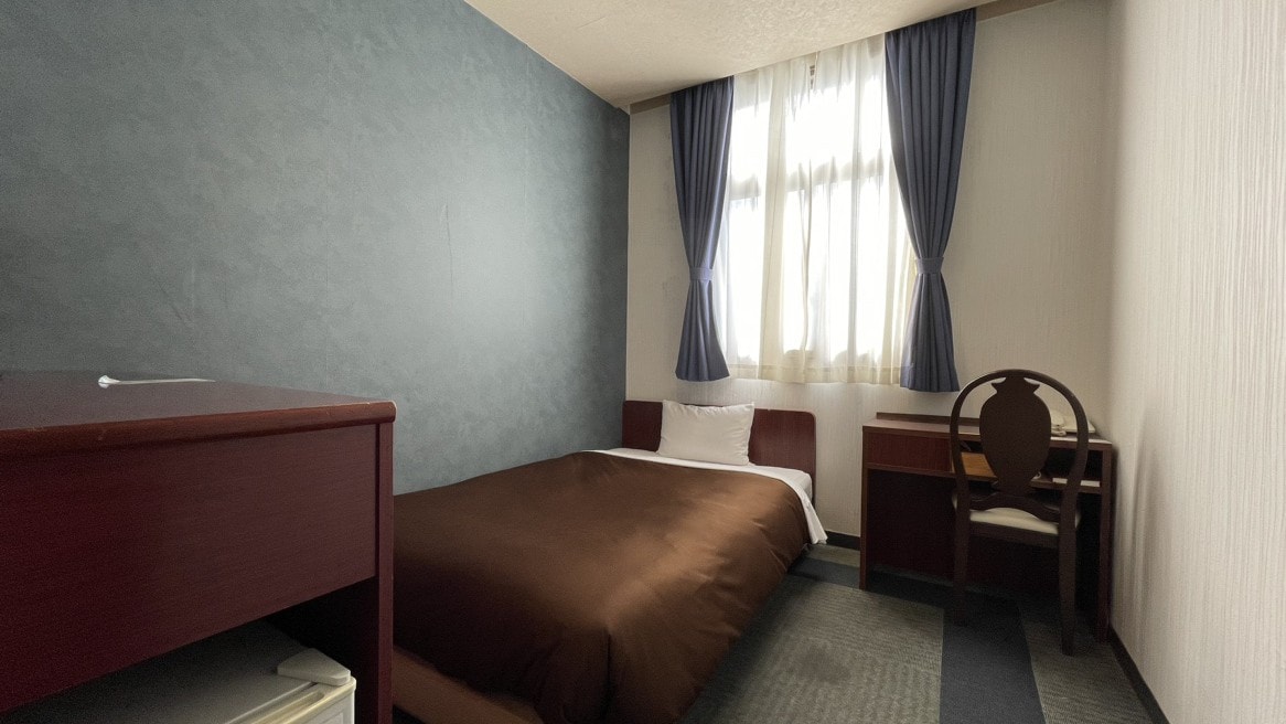 Phòng đơn (12m2) giường rộng 100-120cm