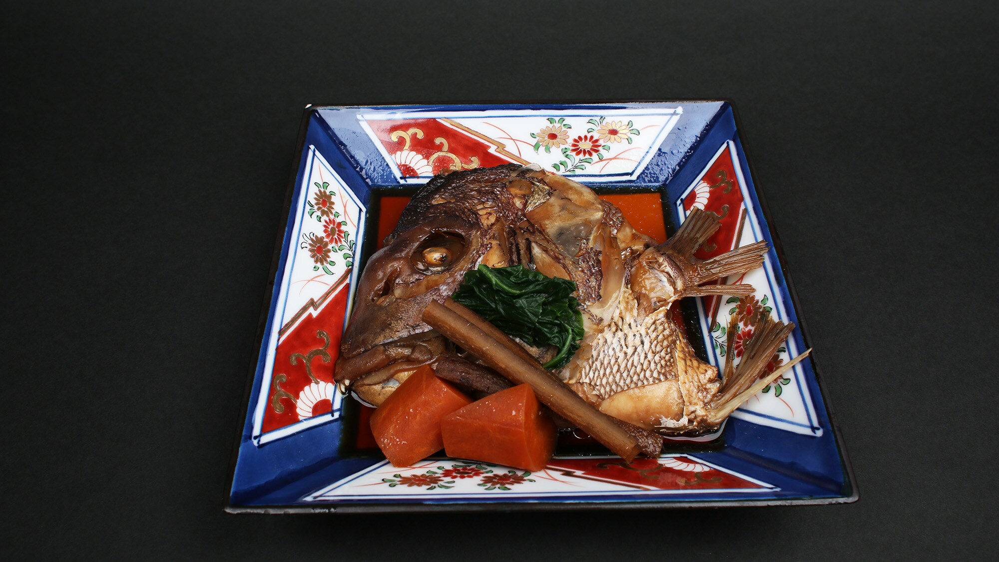 *[Boiled sea bream head] A dish of sea bream head simmered in a sweet and spicy sauce. Goes well with rice.