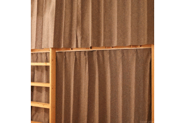 Common to all dormitories. A solid private space when the curtains are closed