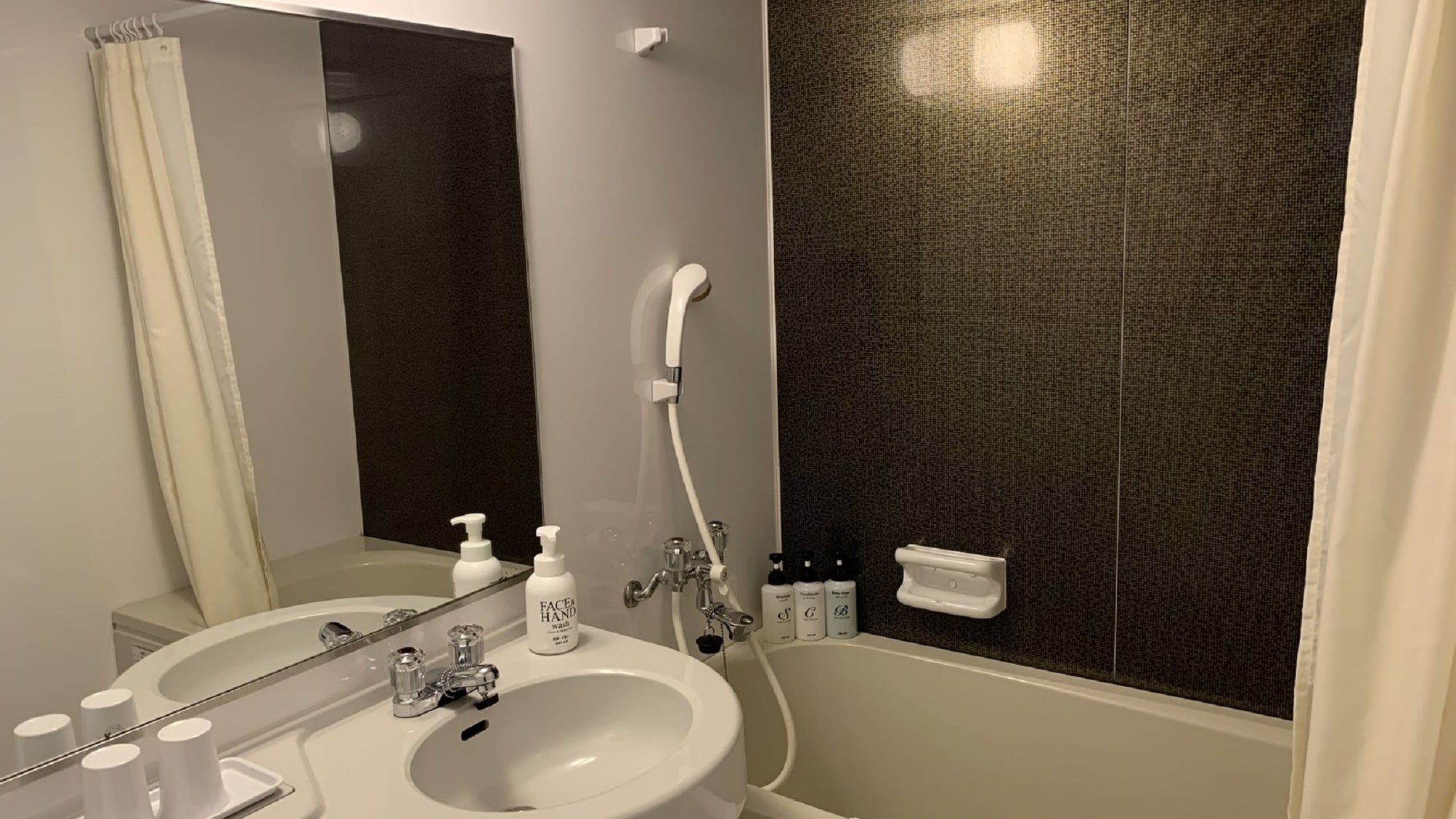 Bathroom (bath towels are on the upper gold shelf)
