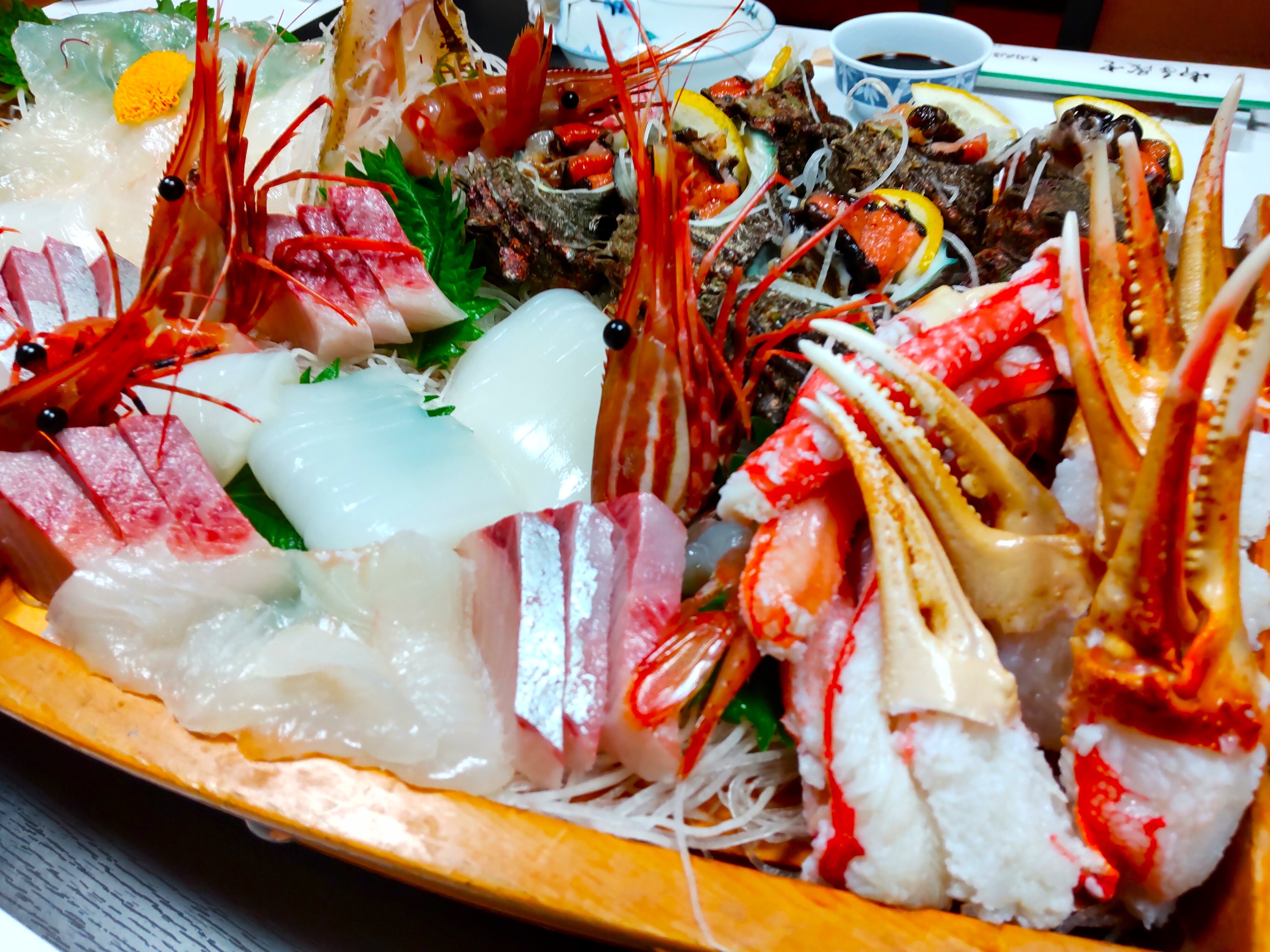 Boat-style platter and crab sashimi
