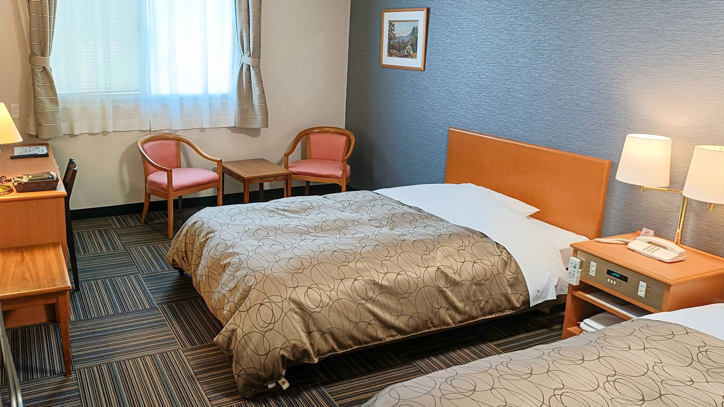 [Deluxe Twin] Lebih besar dari twin standar, menawarkan ruang yang luas dan nyaman.