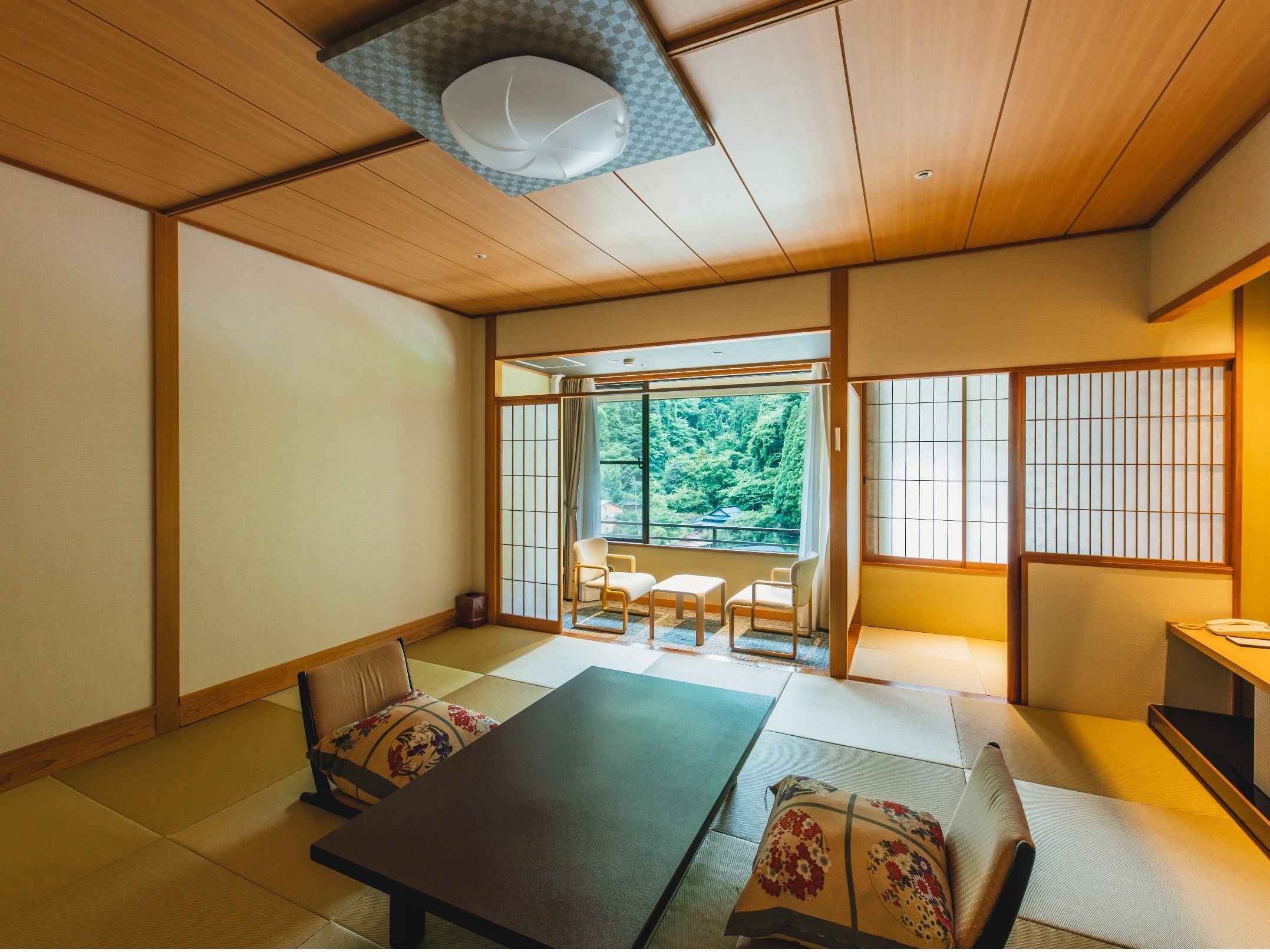An example of a standard Japanese-style room (12 tatami mats) facing the river