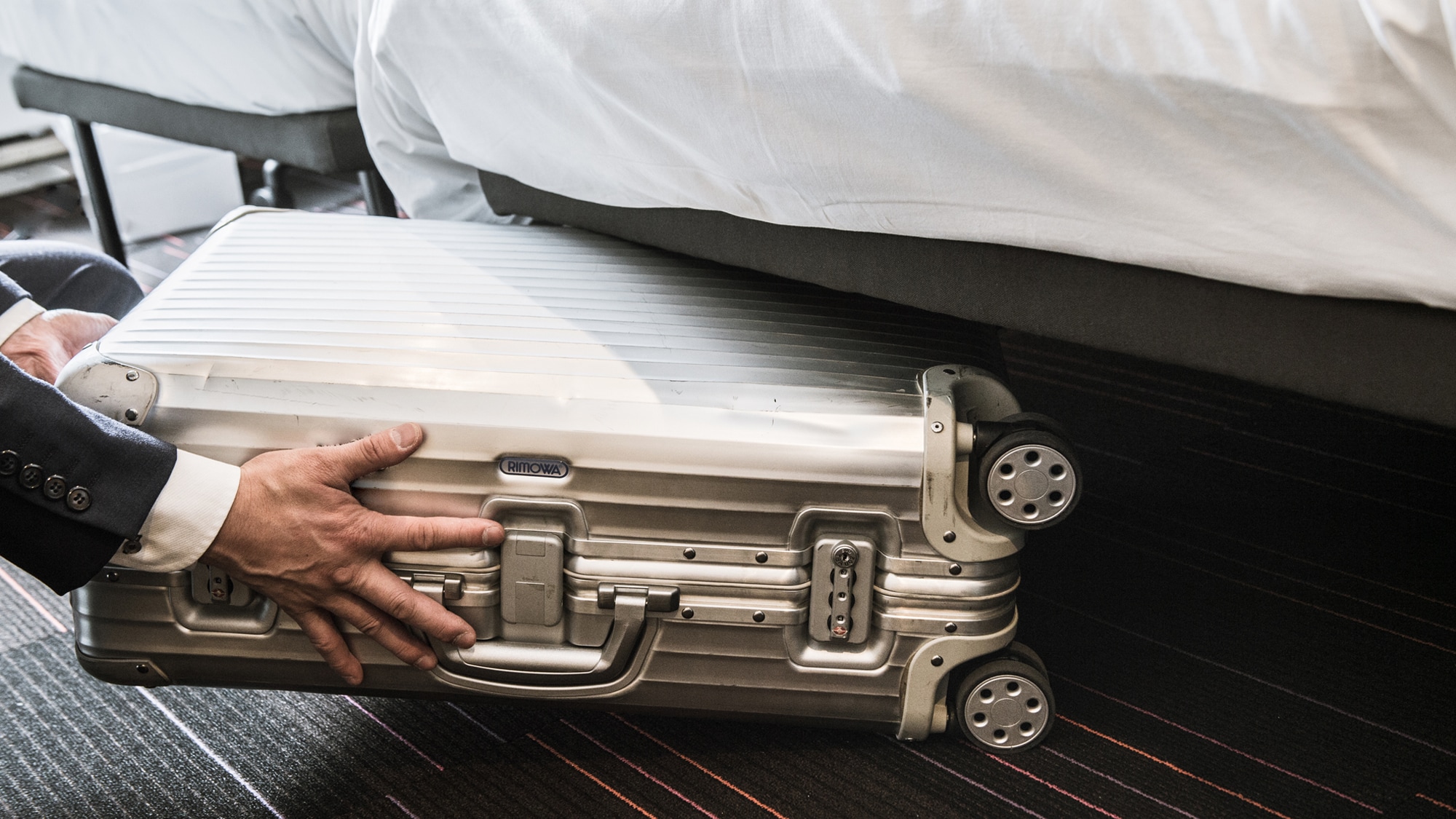 The suitcase is also stored in the bed