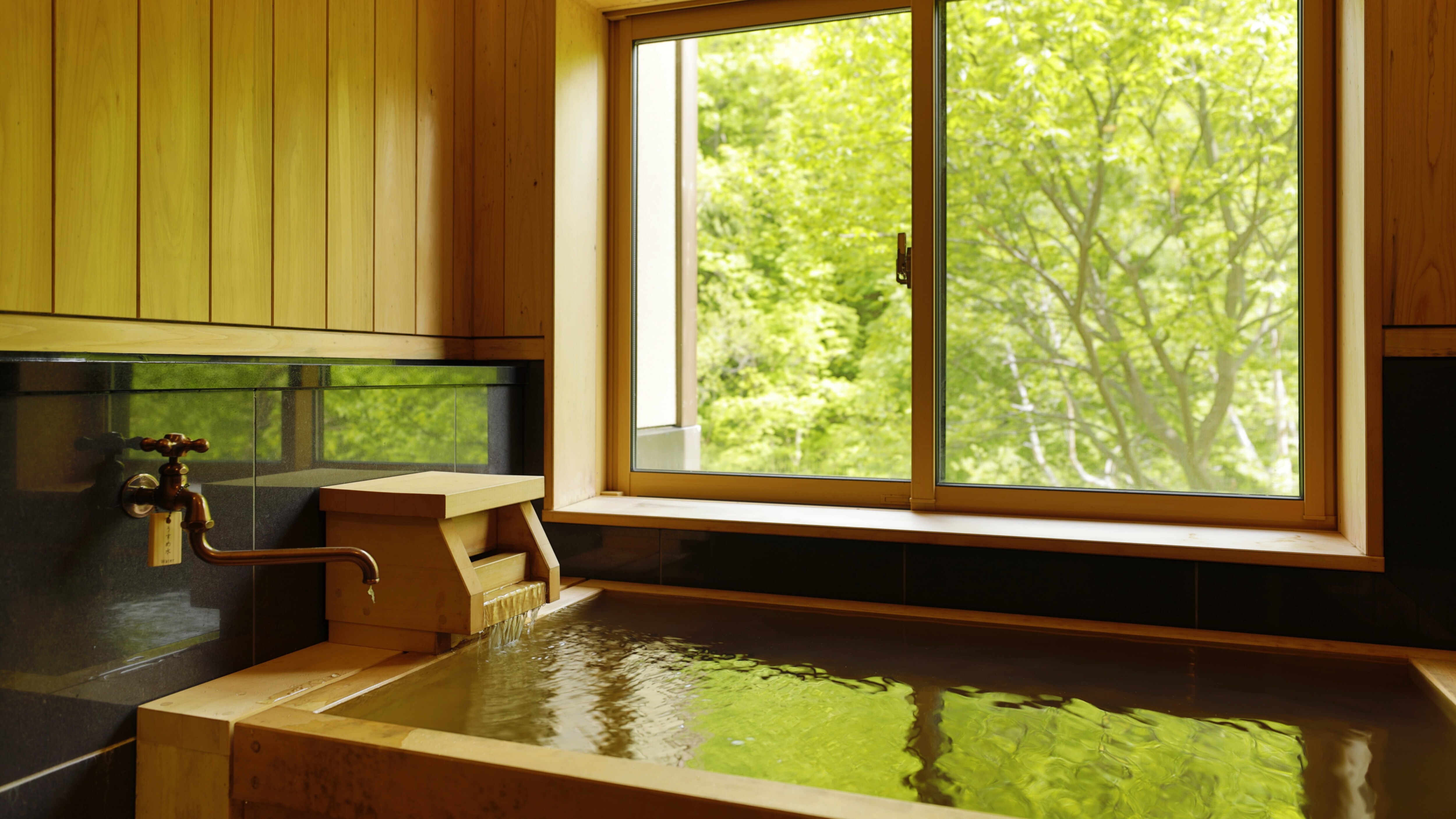 An example of an indoor bath: You can enjoy hot springs fed directly from our own source in the hot spring guest room bath.