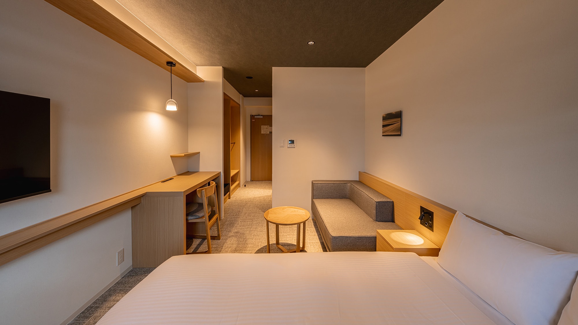 Superior Double | Each guest room features a different artwork depicting a snowy field.