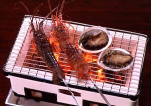 Example of charcoal grilled spiny lobster and abalone