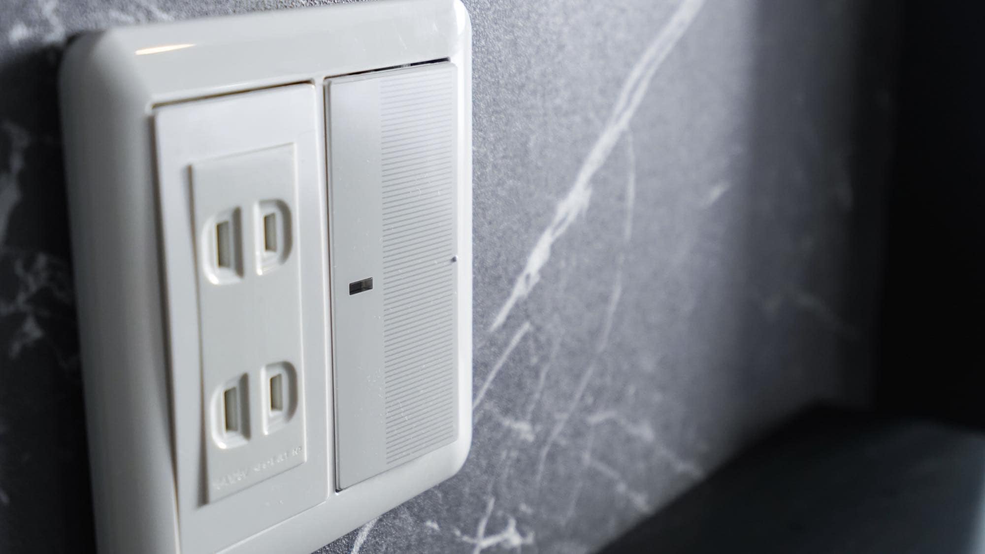 There are plenty of power outlets next to the pillow.