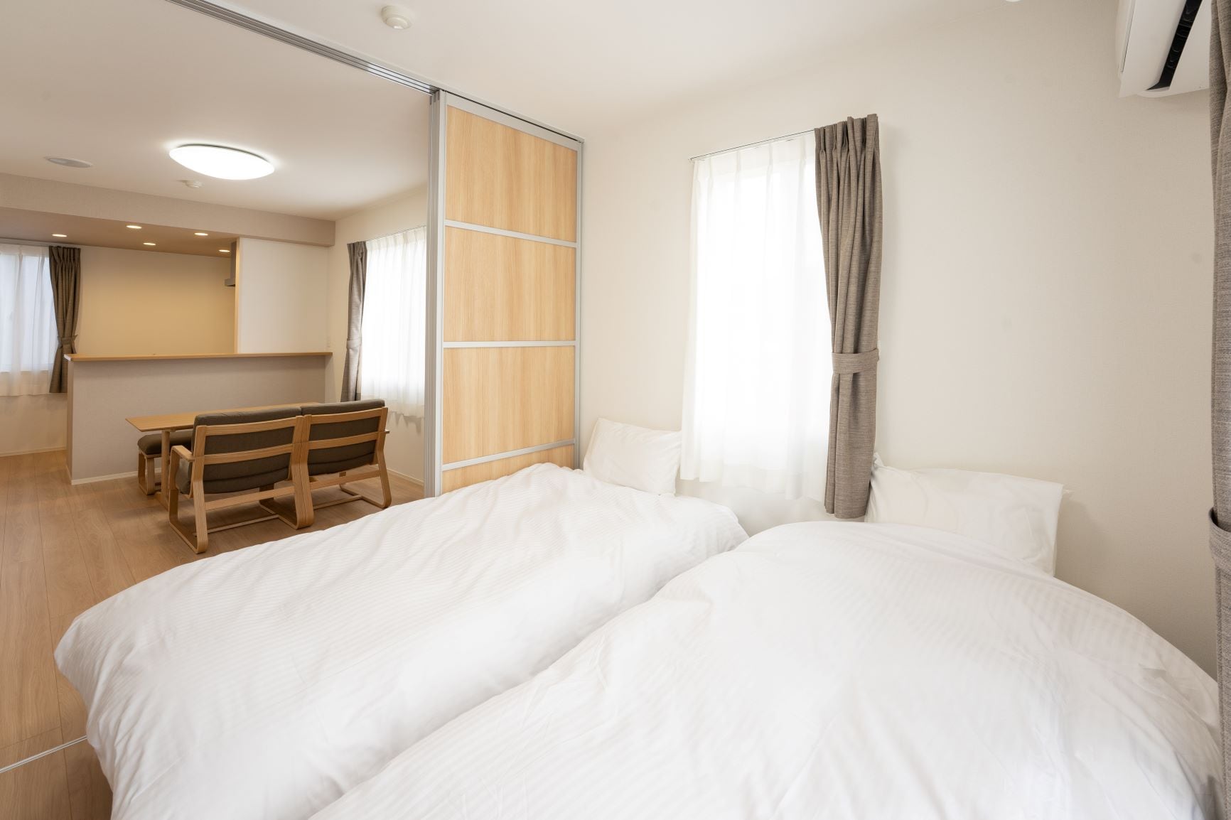 Living/dining/kitchen area from the bed side