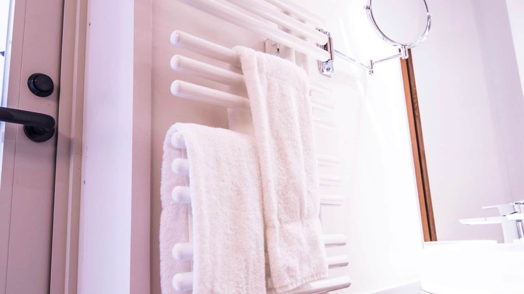 [All rooms have towel warmers]
