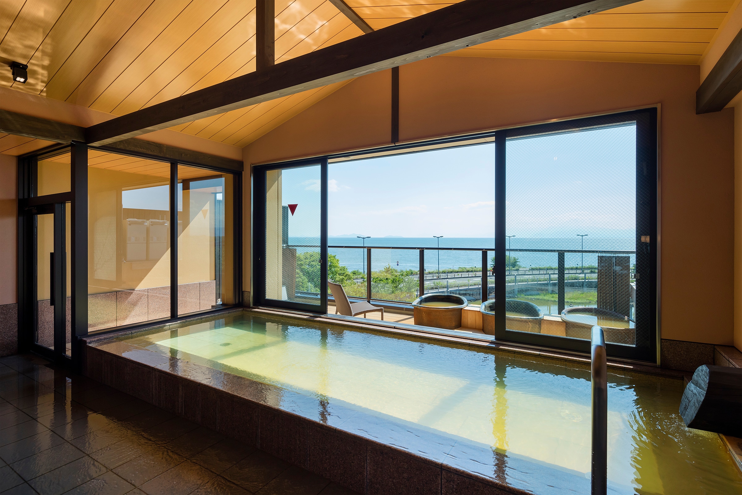 A large public bath with a great view Photo by Yasunori Shimomura