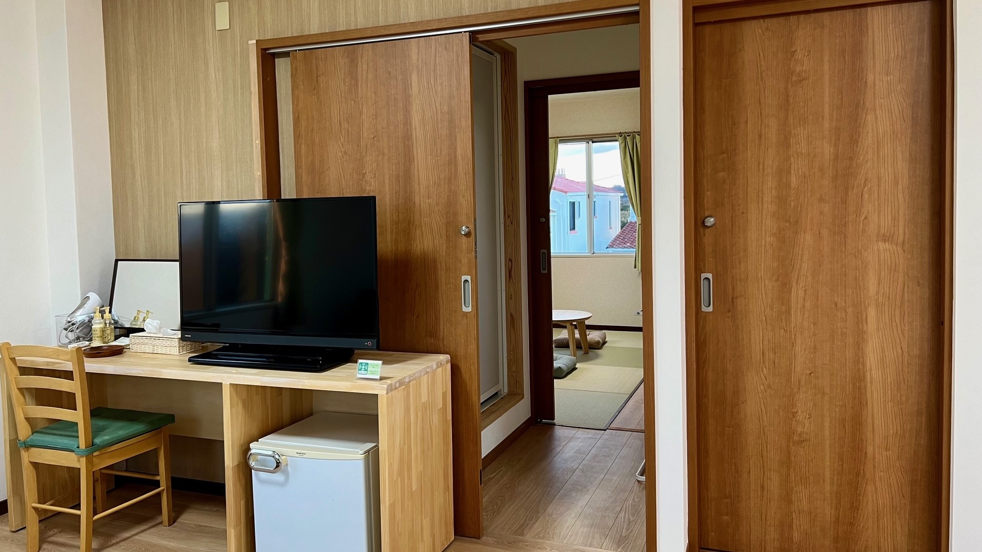 Corridor between Western-style and Japanese-style rooms. Each room has a partition door.