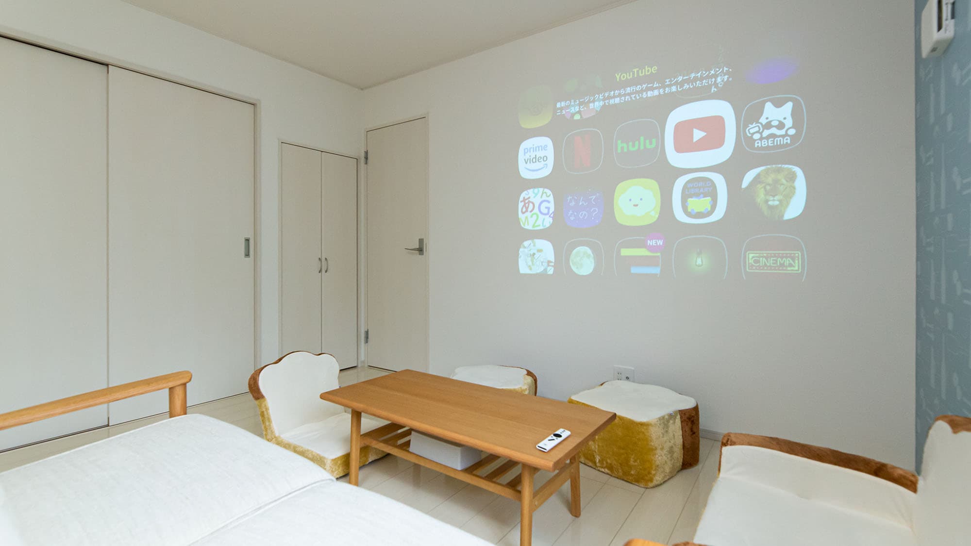 [Building C - Living room] The living room is equipped with a projector.