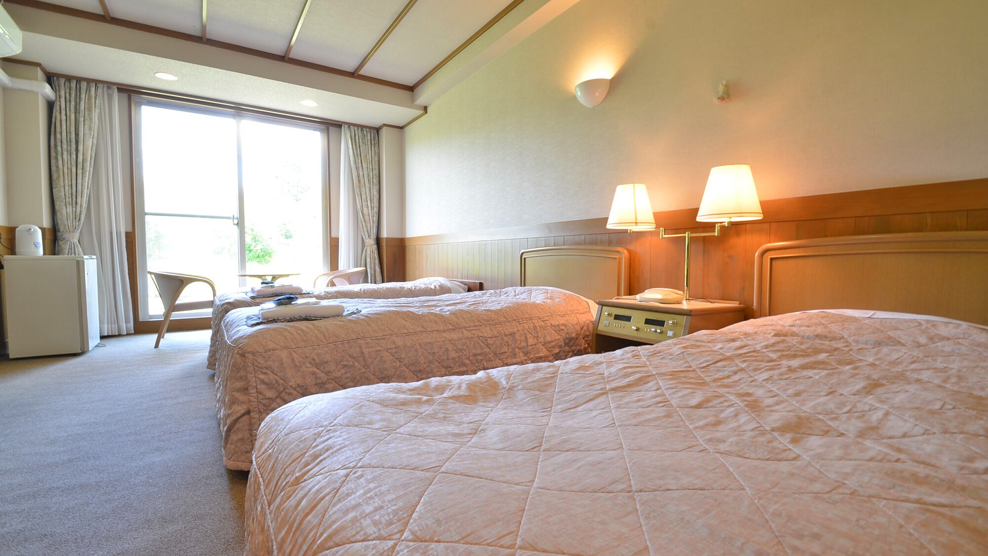 *Example of a guest room: This room is decorated in warm pastel colors so that you can relax and unwind.