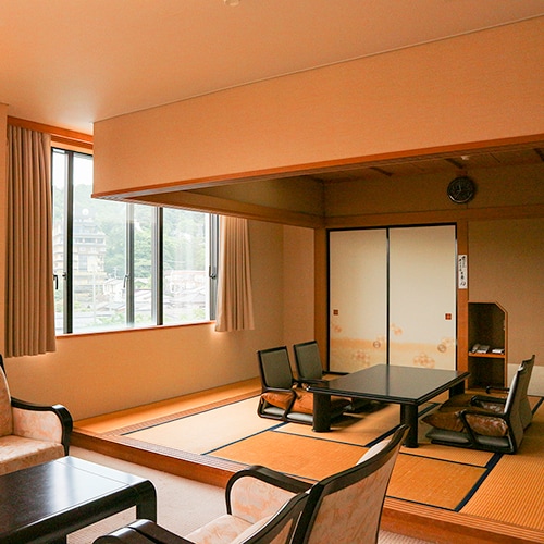 * [Example of a family room on the hot spring town side] A Japanese-style room with 8 tatami mats and a Western-style room with 5 tatami mats (sofa set) with bath and toilet