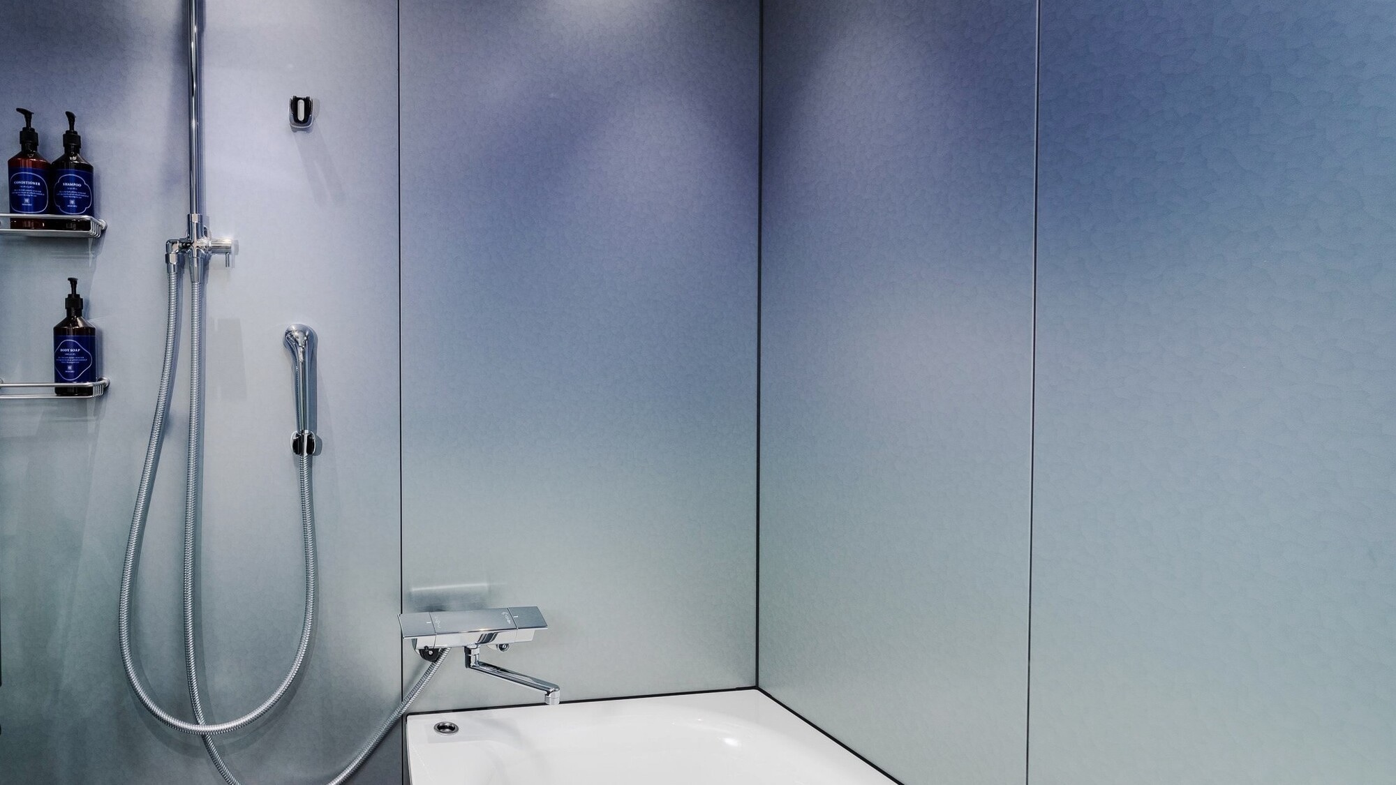 The spacious bathroom will help you relax and unwind