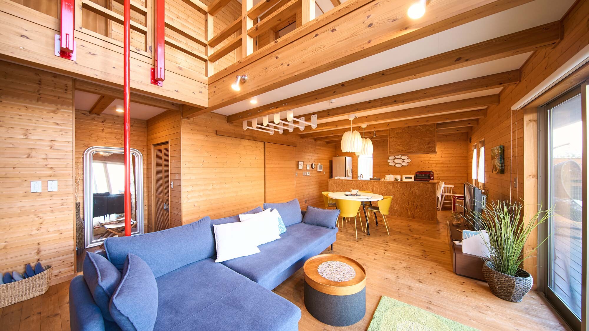 Living room: A space with a warm texture and wood-like design that exudes the scent of wood.