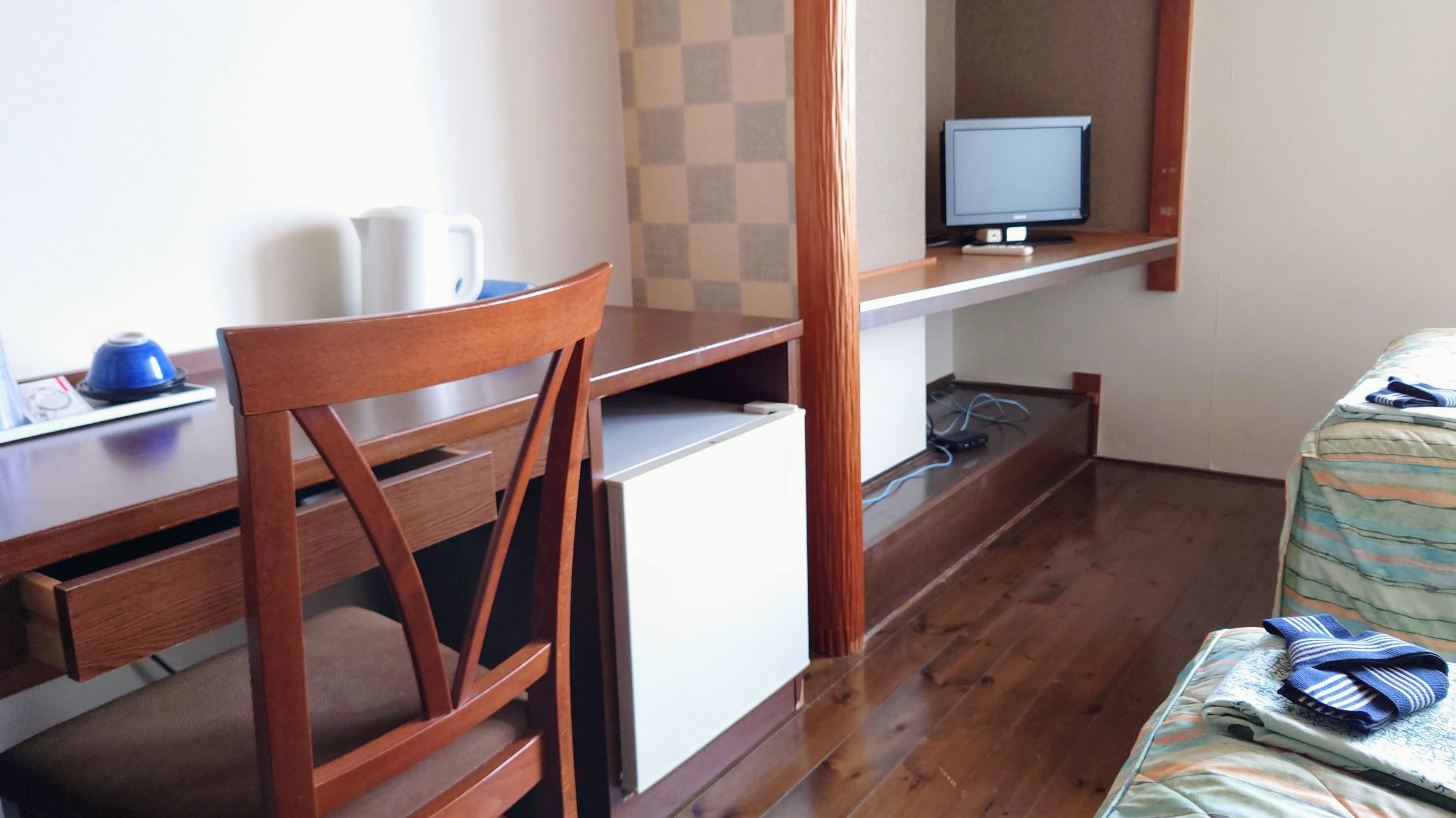[Guest rooms] Rooms have wooden floors.