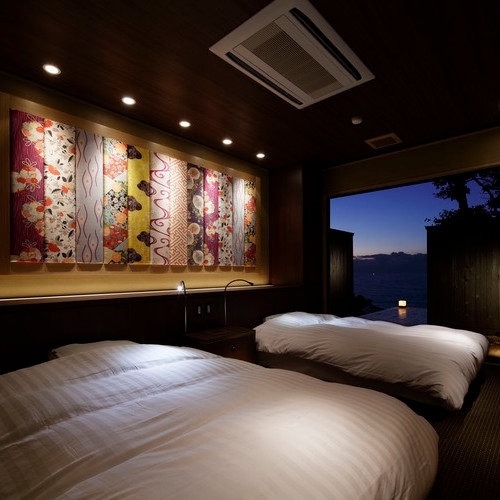 [Phòng khách tại Apartment Kionan Kazenone] Khu vườn cảnh quan khô ráo và đường chân trời của Biển Nhật Bản tạo nên một không gian lạ thường.
