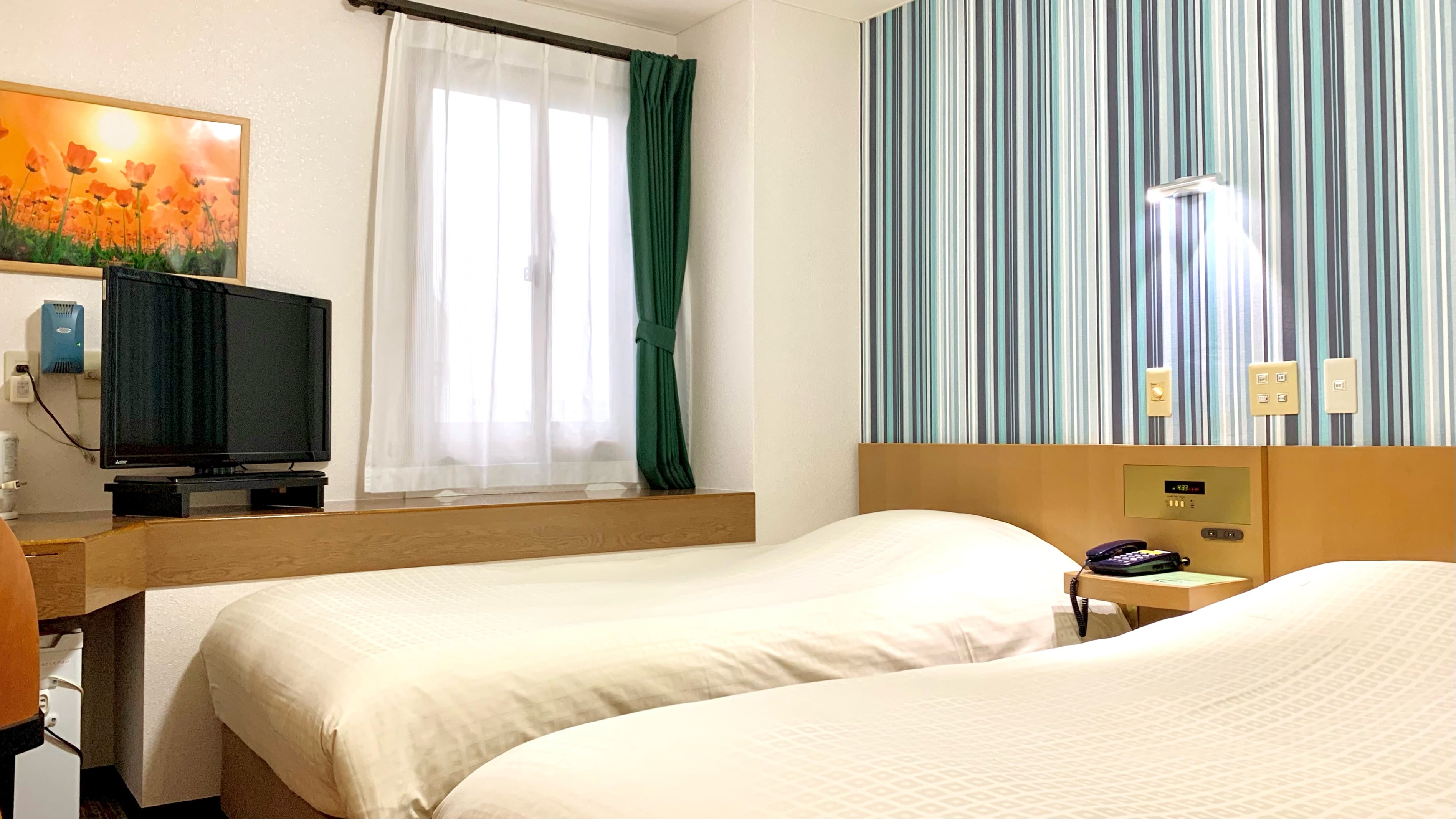 This is an example of the renewed Twin Room A smoking room.