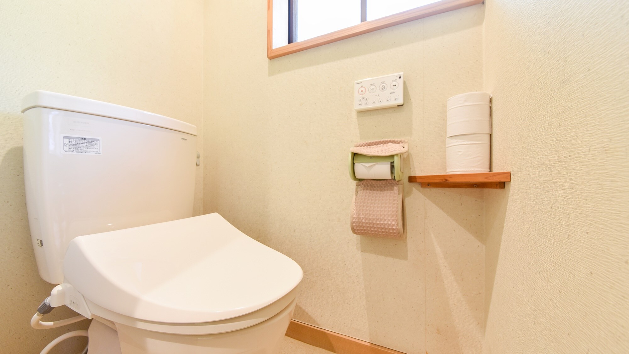 * The guest room toilet is equipped with a washlet.