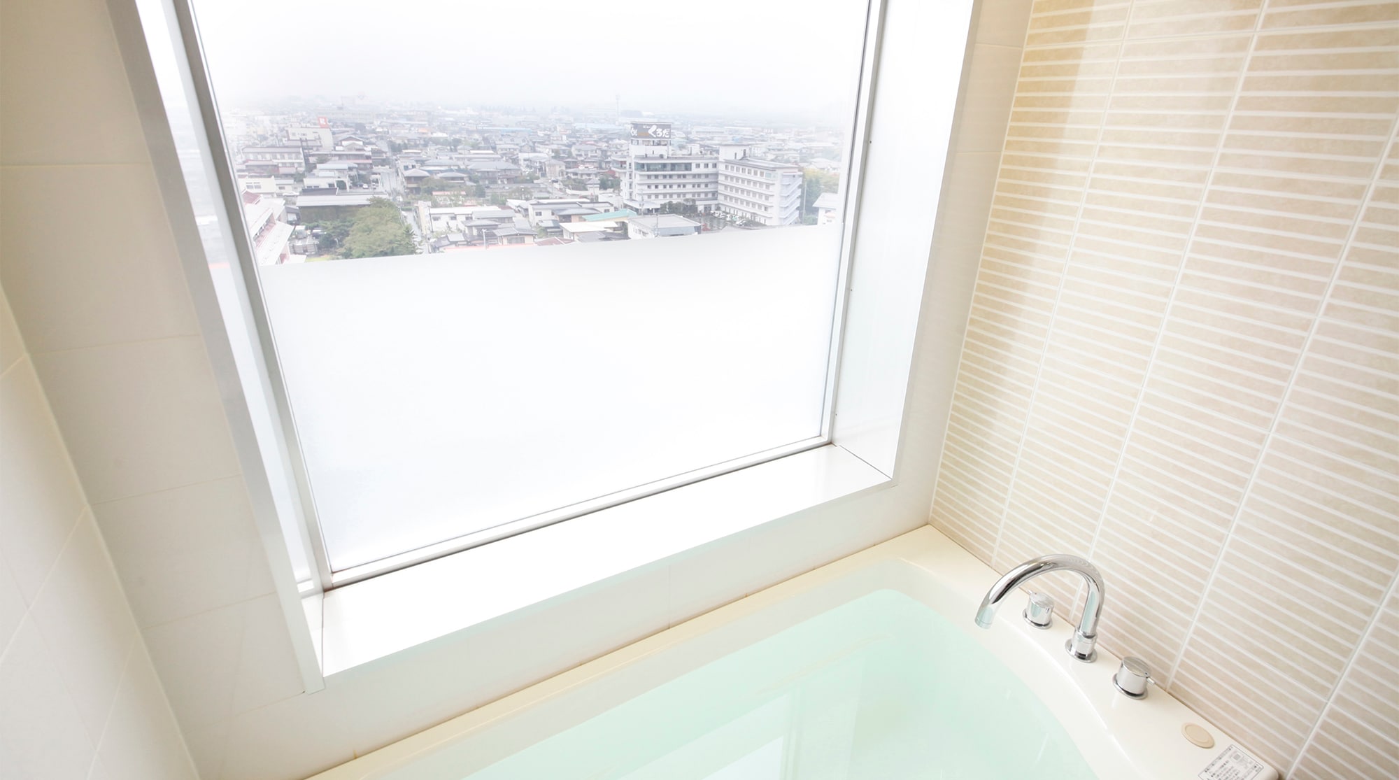 [Deluxe] Japanese-Western twin room (example). Semi-frosted glass bathroom