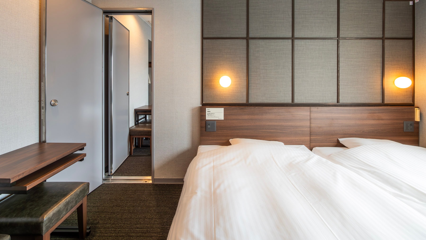 This room has two rooms with a door between them.