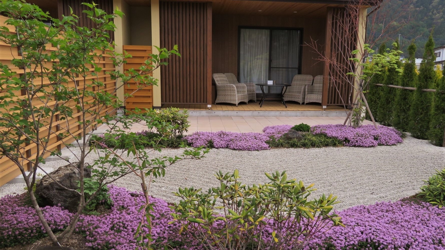 In spring, purple herbs bloom in the garden of each room.