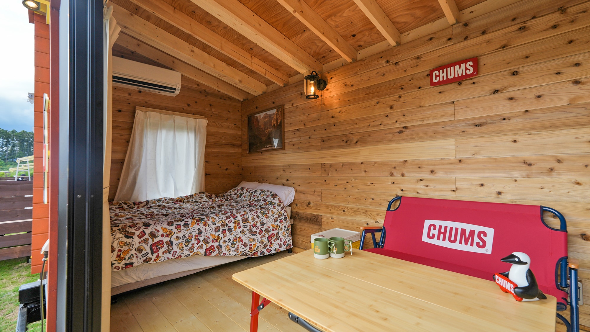 Log trailer house with CHUMS