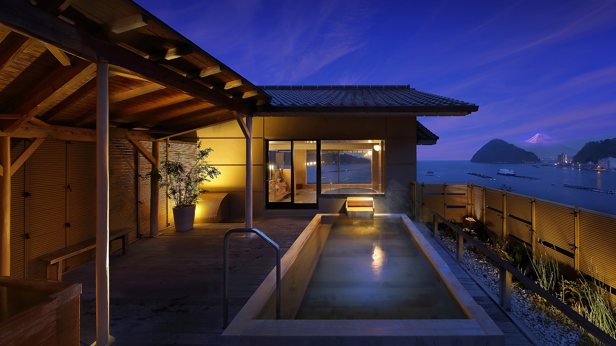 Panoramic large bath and cypress open-air bath "Fuji no Yu" open-air bath (evening view)
