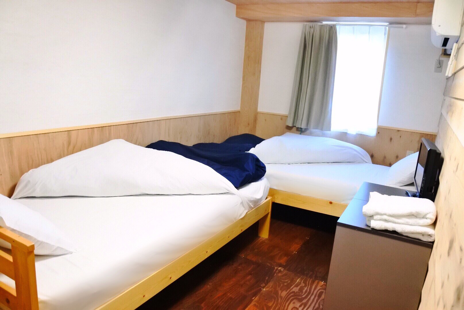 Annex twin room. There is a TV in the room.