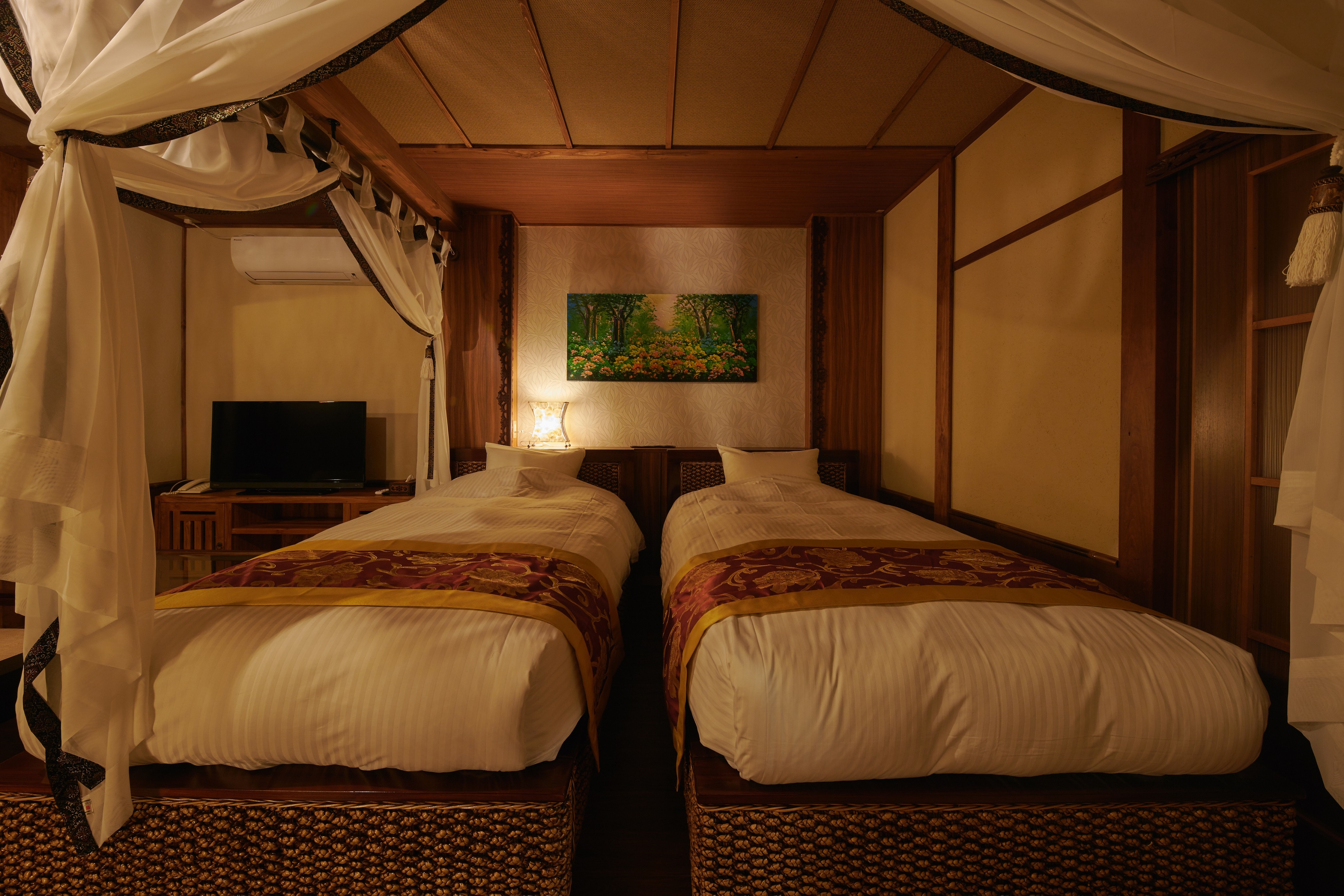 Sanur 2 single beds room accommodates up to 2 adults.