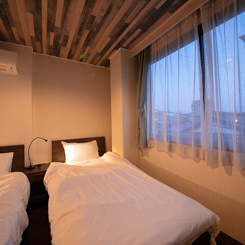 "Example of a Deluxe Room"