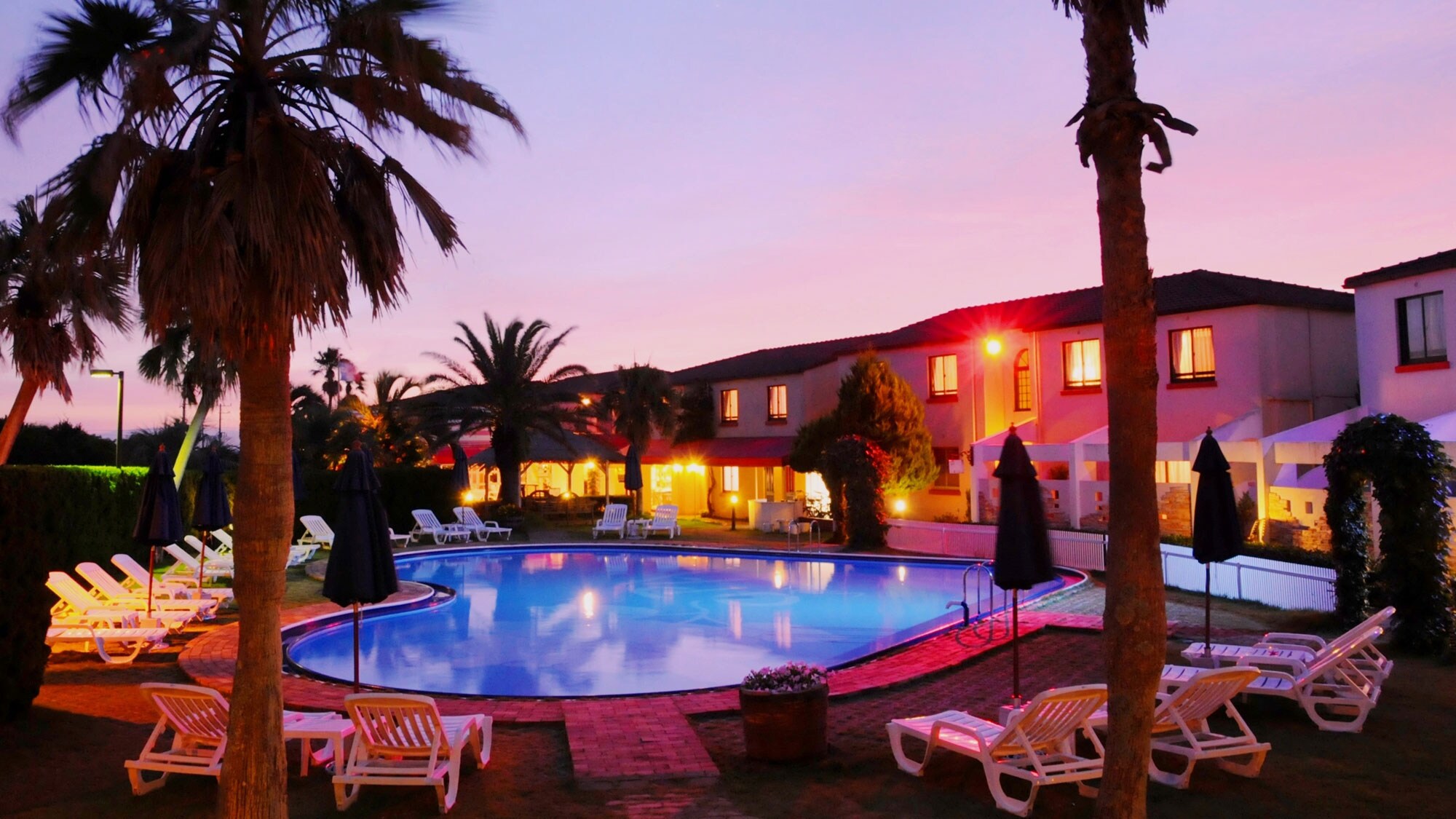 OPA at dusk. Orange to light purple gradation.