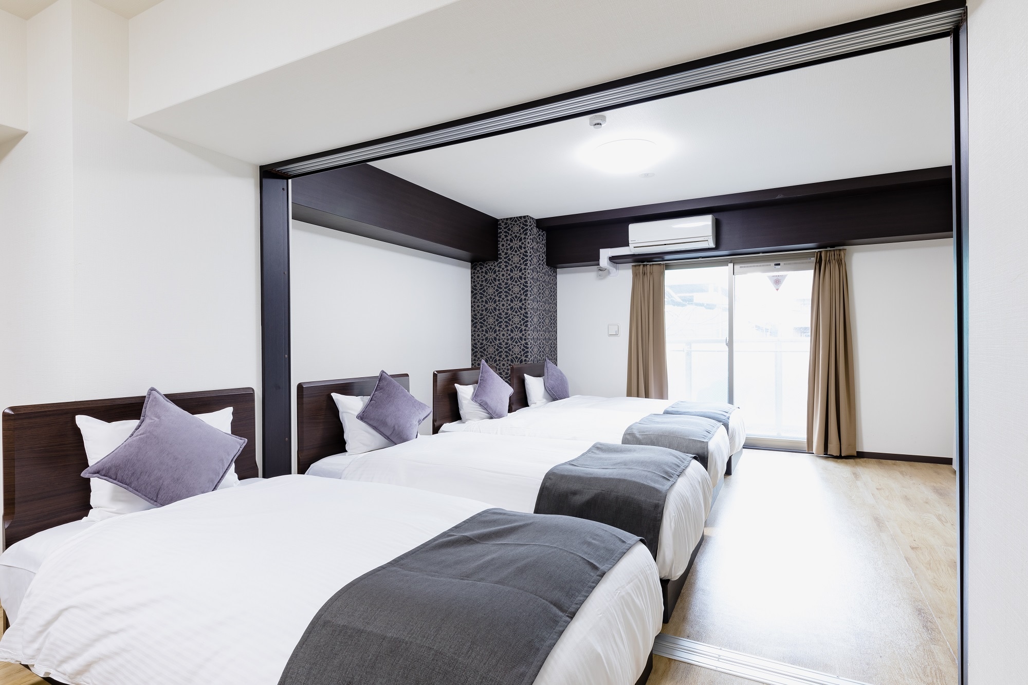 The family room has four single beds.
