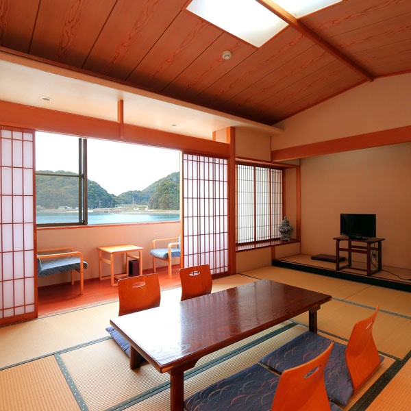 A spacious Japanese-style room with two adjacent rooms