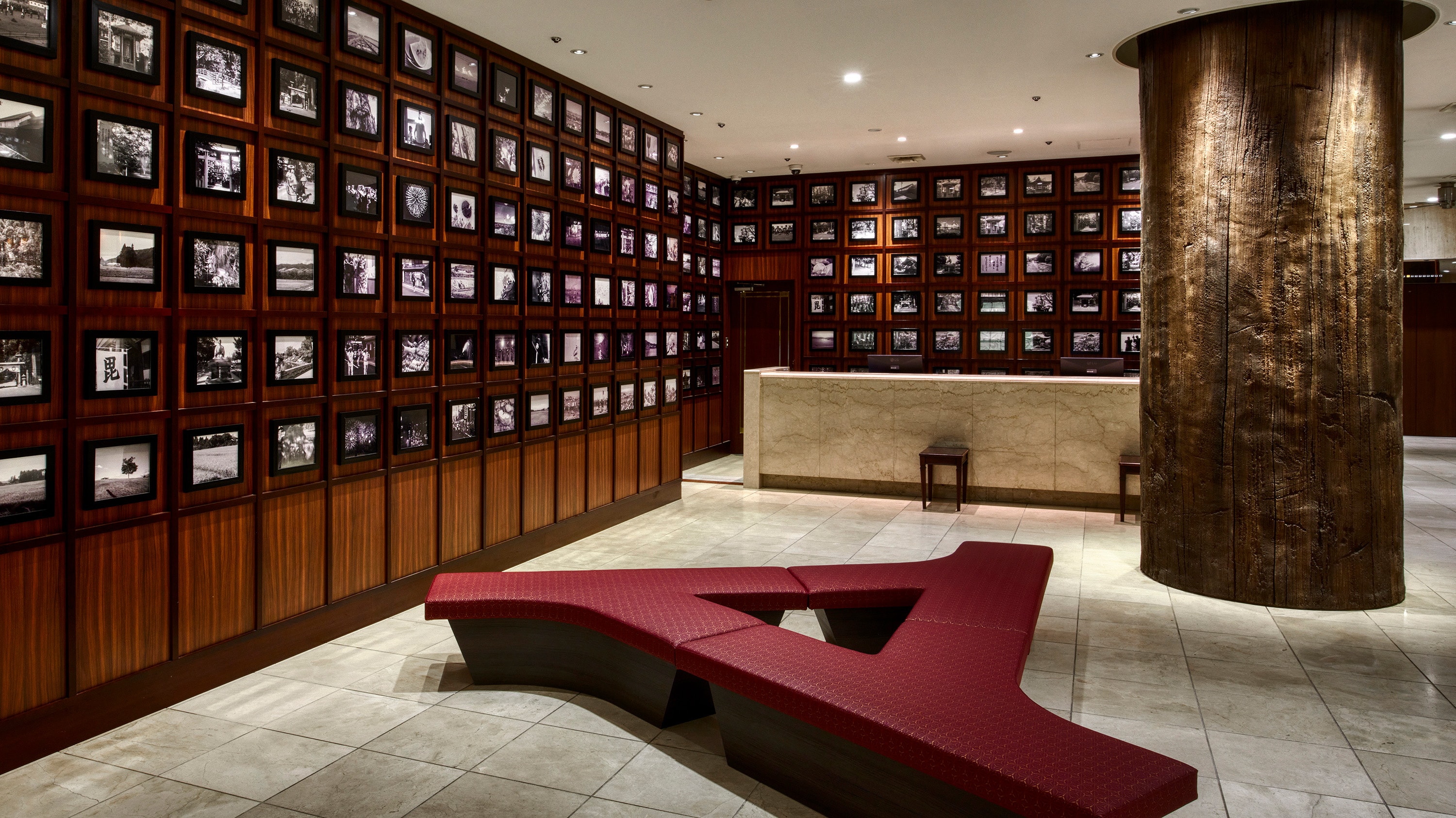 Hotel Lobby | A quaint lobby lined with historical photographs. You will be enveloped in the memories and warmth of Yonezawa.