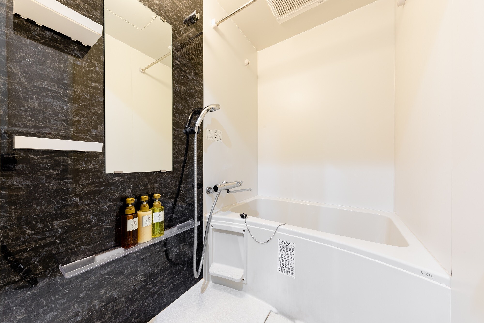 The bathroom has a bathtub so you can relax.