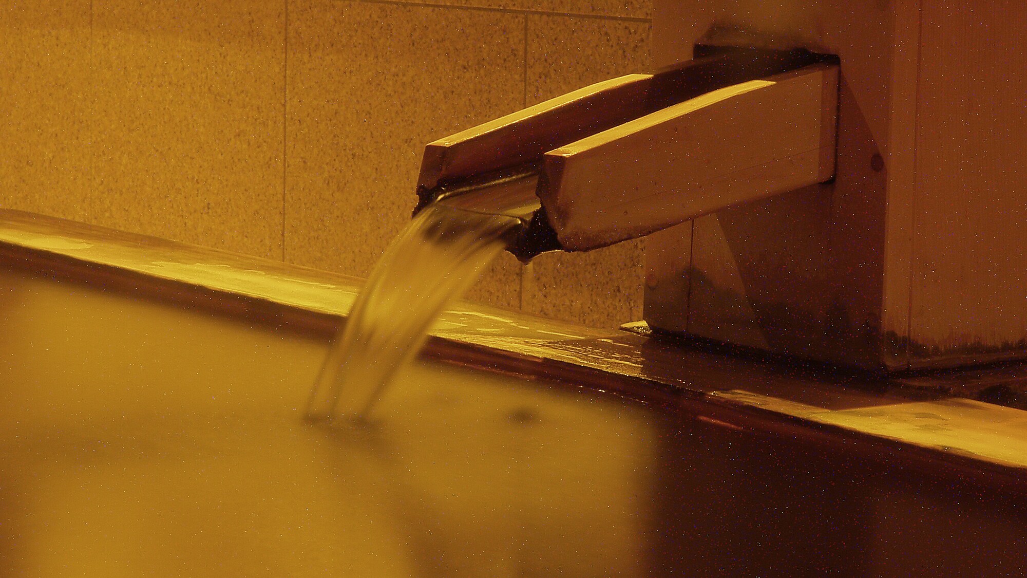 A natural hot spring that flows directly from the source